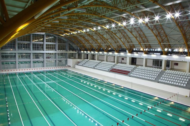 Olympic-size training pool under a timber roof